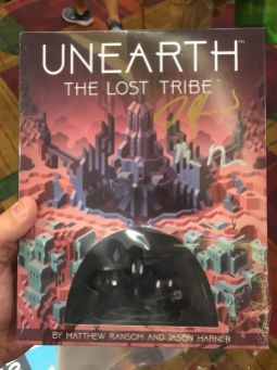 Picked up a copy of the Unearth expansion for some coworkers and was able to get it signed by the designers!